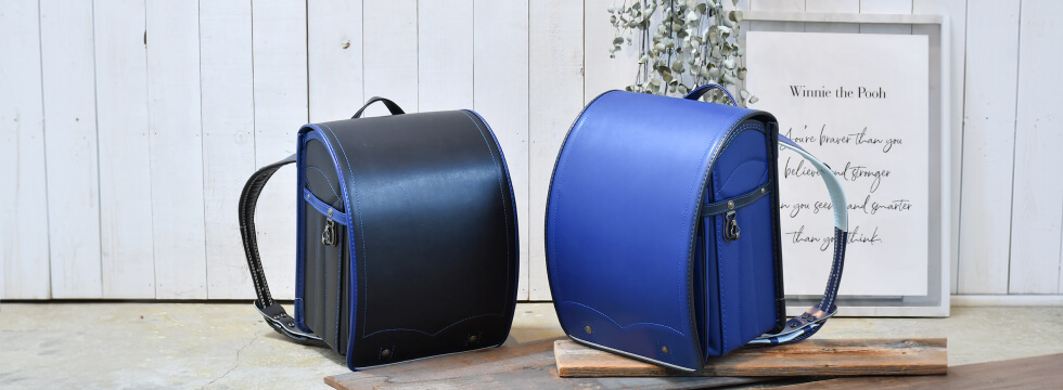 「ふちどり」が映える<br>
「牛革素材」のバイカラーデザイン。